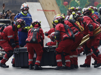 Members of the Secretary of the Navy participate in the National Drill 2024 in the Zocalo of Mexico City, Mexico, on September 19, 2024, to...