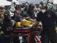 Members of the Heroic Fire Brigade participate in the National Drill 2024 in Mexico City, Mexico, on September 19, 2024, to evaluate and cor...