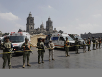 Members of the Mexican army guard the area during the National Drill 2024 in the Zocalo of Mexico City, Mexico, on September 19, 2024, to ev...