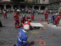 Members of the Secretary of the Navy participate in the National Drill 2024 in the Zocalo of Mexico City, Mexico, on September 19, 2024, to...