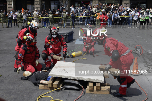 Members of the Secretary of the Navy participate in the National Drill 2024 in the Zocalo of Mexico City, Mexico, on September 19, 2024, to...