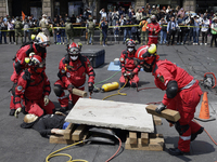 Members of the Secretary of the Navy participate in the National Drill 2024 in the Zocalo of Mexico City, Mexico, on September 19, 2024, to...