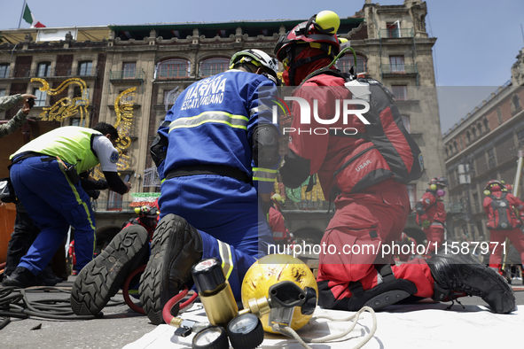 Members of the Secretary of the Navy participate in the National Drill 2024 in the Zocalo of Mexico City, Mexico, on September 19, 2024, to...