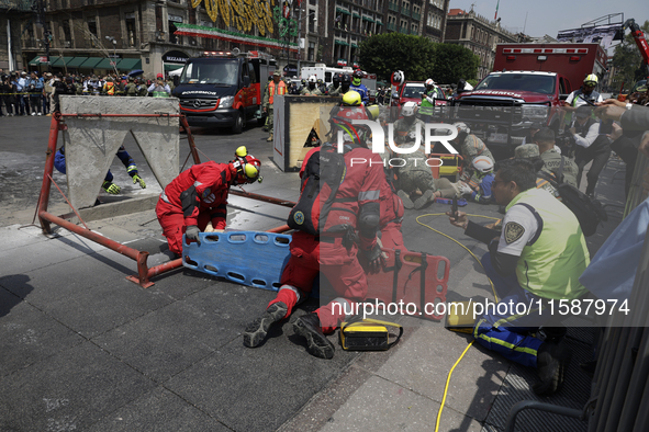 Members of the Secretary of the Navy participate in the National Drill 2024 in the Zocalo of Mexico City, Mexico, on September 19, 2024, to...