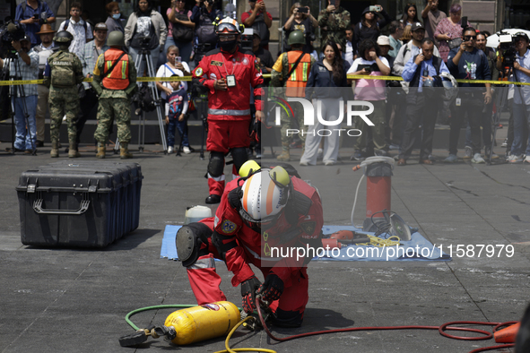 Members of the Secretary of the Navy participate in the National Drill 2024 in the Zocalo of Mexico City, Mexico, on September 19, 2024, to...