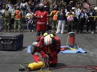 Members of the Secretary of the Navy participate in the National Drill 2024 in the Zocalo of Mexico City, Mexico, on September 19, 2024, to...