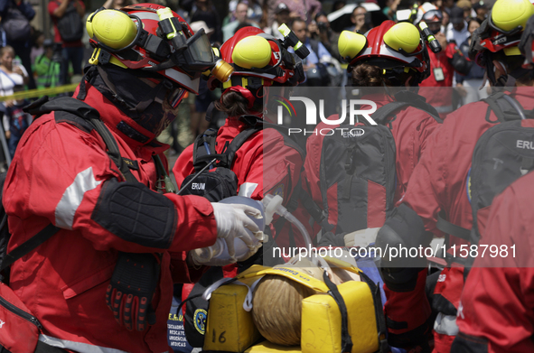 Members of the Secretary of the Navy participate in the National Drill 2024 in the Zocalo of Mexico City, Mexico, on September 19, 2024, to...