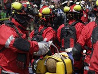 Members of the Secretary of the Navy participate in the National Drill 2024 in the Zocalo of Mexico City, Mexico, on September 19, 2024, to...