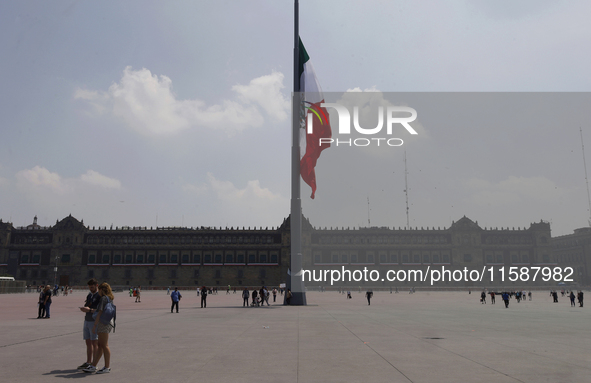 View of Mexico's flag at half-mast in Mexico City, Mexico, on September 19, 2024, during the National Drill 2024 to evaluate and correct res...