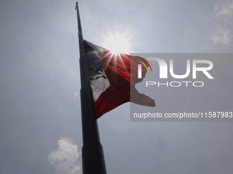 View of Mexico's flag at half-mast in Mexico City, Mexico, on September 19, 2024, during the National Drill 2024 to evaluate and correct res...