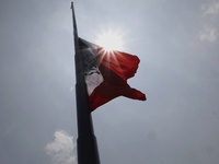 View of Mexico's flag at half-mast in Mexico City, Mexico, on September 19, 2024, during the National Drill 2024 to evaluate and correct res...