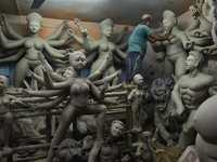 An artisan makes an idol of the Hindu Goddess Durga in Kumartuli, the potter's village in Kolkata, India, on September 20, 2024. The four-da...