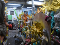 An artisan makes an idol of the Hindu Goddess Durga in Kumartuli, the potter's village in Kolkata, India, on September 20, 2024. The four-da...