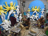 An artisan makes an idol of the Hindu Goddess Durga in Kumartuli, the potter's village in Kolkata, India, on September 20, 2024. The four-da...