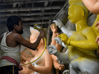 An artisan makes an idol of the Hindu Goddess Durga in Kumartuli, the potter's village in Kolkata, India, on September 20, 2024. The four-da...