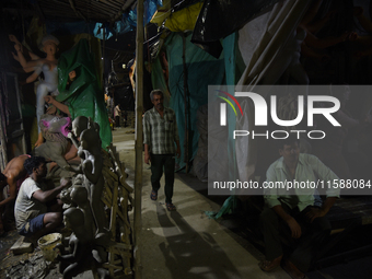 An artisan makes an idol of the Hindu Goddess Durga in Kumartuli, the potter's village in Kolkata, India, on September 20, 2024. The four-da...