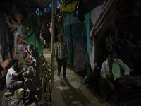 An artisan makes an idol of the Hindu Goddess Durga in Kumartuli, the potter's village in Kolkata, India, on September 20, 2024. The four-da...