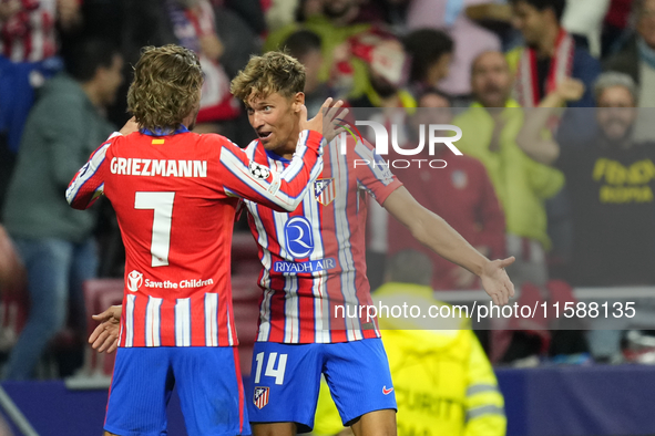 Antoine Griezmann second striker of Atletico de Madrid and France celebrates after scoring his sides first goal with Marcos Llorente during...