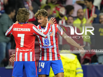 Antoine Griezmann second striker of Atletico de Madrid and France celebrates after scoring his sides first goal with Marcos Llorente during...