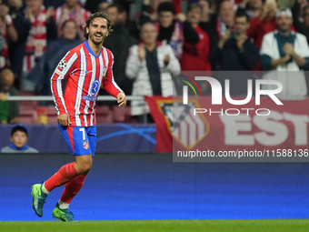 Antoine Griezmann second striker of Atletico de Madrid and France celebrates after scoring his sides first goal during the UEFA Champions Le...