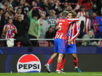 Antoine Griezmann second striker of Atletico de Madrid and France celebrates after scoring his sides first goal during the UEFA Champions Le...