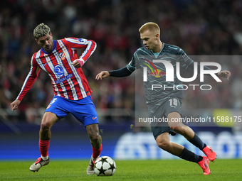 Arthur Vermeeren central midfield of RB Leipzig and Belgium and Rodrigo de Paul central midfield of Atletico de Madrid and Argentina compete...