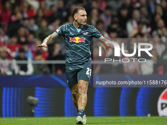 David Raum left-Back of RB Leipzig and Germany reacts during the UEFA Champions League 2024/25 League Phase MD1 match between Atletico de Ma...