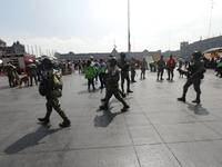 Rescuers and firefighters simulate an accident caused by the collapse of a building during the national earthquake drill with a magnitude of...