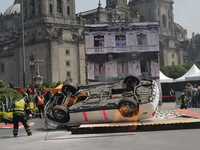 Rescuers and firefighters simulate an accident caused by the collapse of a building during the national earthquake drill with a magnitude of...