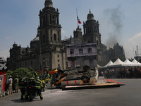 Rescuers and firefighters simulate an accident caused by the collapse of a building during the national earthquake drill with a magnitude of...