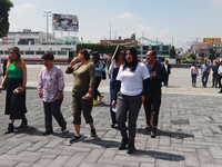 Mexican citizens take part in the 2024 National drill for a hypothetical earthquake of magnitude 7.5 on the Richter scale with an epicenter...