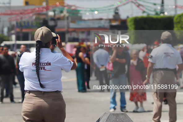 Civil protection workers take part in the 2024 National drill of a hypothetical earthquake of magnitude 7.5 on the Richter seismological sca...