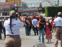 Civil protection workers take part in the 2024 National drill of a hypothetical earthquake of magnitude 7.5 on the Richter seismological sca...