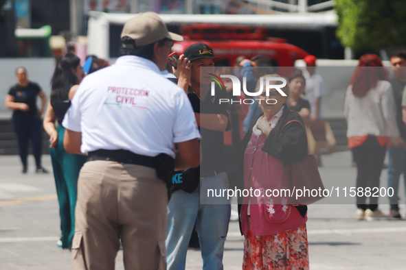 Civil protection workers take part in the 2024 National drill of a hypothetical earthquake of magnitude 7.5 on the Richter seismological sca...