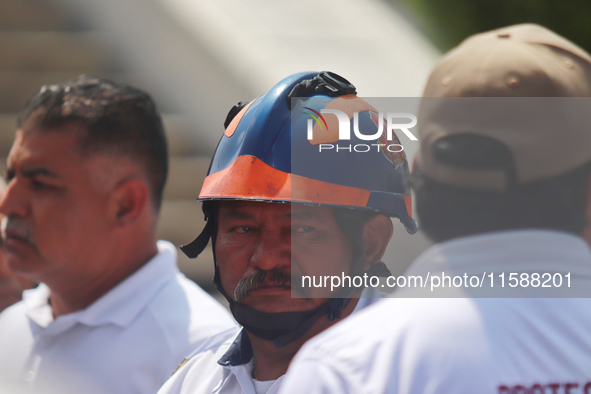 Civil protection workers take part in the 2024 National drill of a hypothetical earthquake of magnitude 7.5 on the Richter seismological sca...