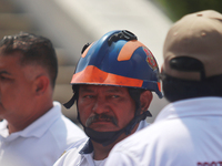 Civil protection workers take part in the 2024 National drill of a hypothetical earthquake of magnitude 7.5 on the Richter seismological sca...