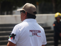 Civil protection workers take part in the 2024 National drill of a hypothetical earthquake of magnitude 7.5 on the Richter seismological sca...