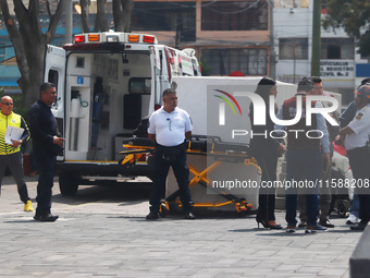 Mexican citizens take part in the 2024 National drill for a hypothetical earthquake of magnitude 7.5 on the Richter scale with an epicenter...