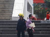 Members of the Fire Department take part in the 2024 national drill of a hypothetical earthquake of magnitude 7.5 on the Richter scale with...