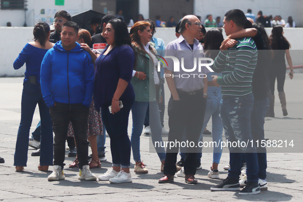 Mexican citizens take part in the 2024 National drill for a hypothetical earthquake of magnitude 7.5 on the Richter scale with an epicenter...