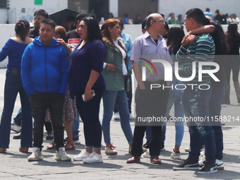 Mexican citizens take part in the 2024 National drill for a hypothetical earthquake of magnitude 7.5 on the Richter scale with an epicenter...