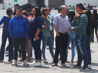 Mexican citizens take part in the 2024 National drill for a hypothetical earthquake of magnitude 7.5 on the Richter scale with an epicenter...