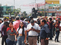 Mexican citizens take part in the 2024 National drill for a hypothetical earthquake of magnitude 7.5 on the Richter scale with an epicenter...