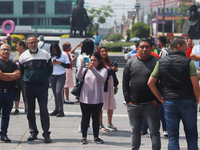 Mexican citizens take part in the 2024 National drill for a hypothetical earthquake of magnitude 7.5 on the Richter scale with an epicenter...