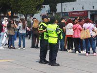 Mexican citizens take part in the 2024 National drill for a hypothetical earthquake of magnitude 7.5 on the Richter scale with an epicenter...