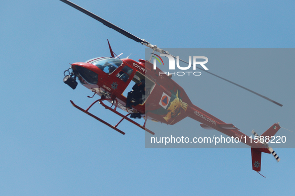 Civil protection workers take part in the 2024 National drill of a hypothetical earthquake of magnitude 7.5 on the Richter seismological sca...