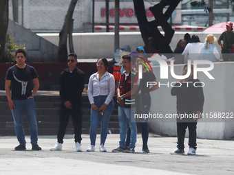 Mexican citizens take part in the 2024 National drill for a hypothetical earthquake of magnitude 7.5 on the Richter scale with an epicenter...