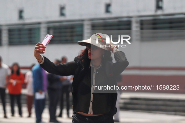 Mexican citizens take part in the 2024 National drill for a hypothetical earthquake of magnitude 7.5 on the Richter scale with an epicenter...