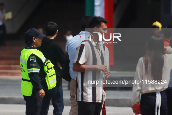 Mexican citizens take part in the 2024 National drill for a hypothetical earthquake of magnitude 7.5 on the Richter scale with an epicenter...