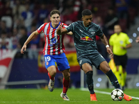 Benjamin Henrichs right-back of RB Leipzig and Germany and Julian Alvarez centre-forward of Atletico de Madrid and Argentina compete for the...